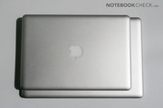 In comparison of dimensions, the 13" model is considerably smaller than the 15" MBP