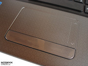 The touchpad has a dedicated scroll bar.