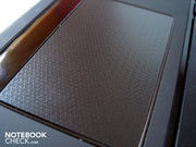 The touchpad also has a fine texture.