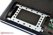 The hard drive is mounted in a mounting frame ...