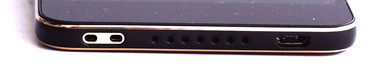 Lower edge: Wrist strap anchor point, speaker, USB 2.0