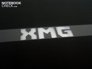 The XMG logo lights up blue when the notebook's in use.