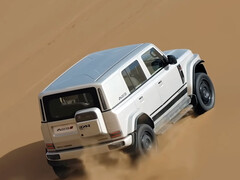 Electric off-road vehicle on the sand dunes of Dubai.
