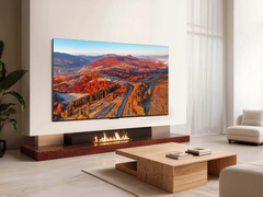 The TCL QM8L/C8L mounted on the wall.