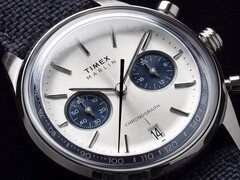 Close-up of the Timex Marlin Jet Chronograph TW2Y89900 showing its silver-white dial, navy subdials, applied hour markers, baton hands, tachymeter scale, and date window.