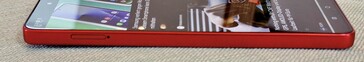 Left: SIM slot
