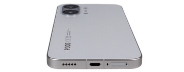 Bottom: speaker, USB, microphone, SIM