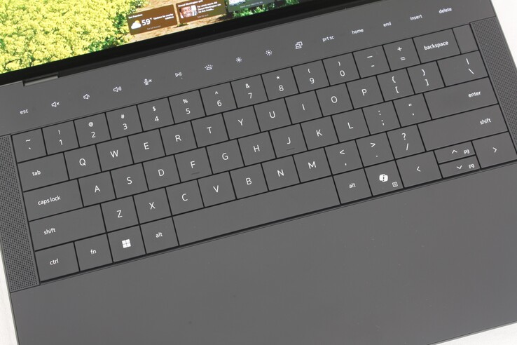 The touch-sensitive auxiliary/function keys and clickpad with invisible borders may turn off some business or professional users