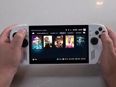 The Asus ROG Ally running Bazzite 43 shows a game library featuring Celeste, DOOM: The Dark Ages, Megabonk, and Returnal. (The Phawx via YouTube)