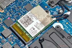 The Intel Wi-Fi 6E AX211 WLAN card shows relatively stable transfer rates