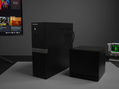 The Minisforum 895D7 is slimmer but taller than the Steam Deck. Pictured: the two systems side by side.
