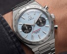 Close-up of the Timex Q Timex Continental Chronograph TW2Y92400 worn on a wrist, featuring an ice-blue radial CD-style dial, black sub-dials, silver tachymeter bezel, and integrated stainless-steel bracelet.