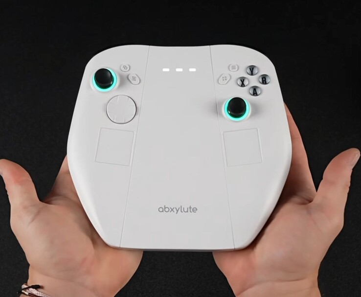 Abxylute 3D One detachable controller module, featuring dual thumbsticks with LED rings, a D-pad, face buttons, and built-in trackpads. (Image source: ETA PRIME via YouTube)