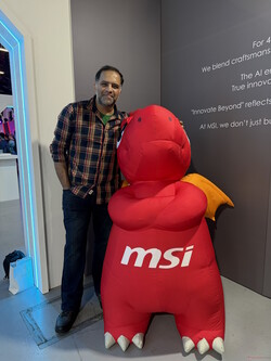 With MSI's mascot, Lucky the dragon.