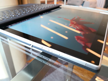 Envy x2 ARM. Supposedly no display, color, or brightness differences between the two models