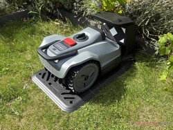 TerraMow Mini 500 in its charging station