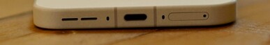 Bottom: Speaker, microphone, USB-C port, microphone, SIM slot