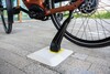 The Tiler Compact Tiler wireless e-bike charger. (Image source: Tiler)