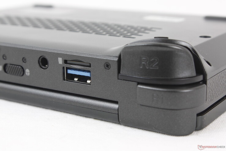Fully inserted MicroSD card sits flush against the edge