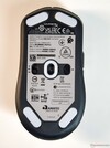 HyperX Pulsefire Fuse Wireless: Bottom with PAW3311 sensor, Wireless/Off switch (left), DPI button (right)