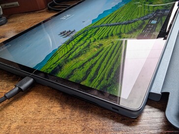 Edge-to-edge Gorilla Glass Victus. There is no OLED option