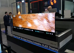 65-inch inkjet printed OLED screen unfolding (Image Source: Charbax on YouTube)