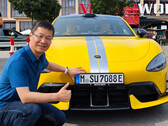 Xiaomi president posing with an SU7 Ultra registered in Germany (Image source: William Lu on Weibo)