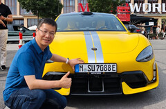 Xiaomi president posing with an SU7 Ultra registered in Germany (Image source: William Lu on Weibo)