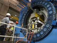This image shows the installation of the inner hadronic calorimeter within the sPHENIX (Image source: Brookhaven National Laboratory; cropped)