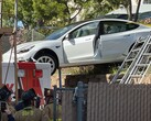 This Model 3 acceleration that landed it on top of an ambulance was ruled a pedal mishap (image: SDFD)