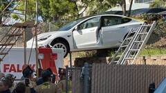 This Model 3 acceleration that landed it on top of an ambulance was ruled a pedal mishap (image: SDFD)