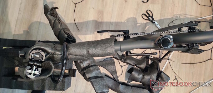 The handlebars, saddle, and pedals still need to be installed
