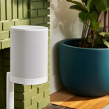 The Era 100 SL mounted on a Sonos stand.