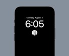 iOS 16's AOD implementation does not show a background image when using a third-party wallpaper. (Image source: @rhogelleim)