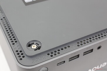 Servicing screws are located underneath the rubber feet