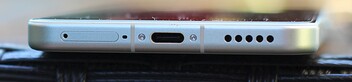 Bottom: SIM slot, microphone, USB-C port, speaker