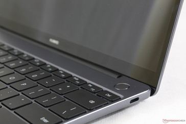 MateBook 13. Narrower chin with glossy edge-to-edge glass