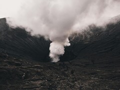An image showing smoke escaping from a volcano. (Image source:  Roman Kirienko - Pexels)