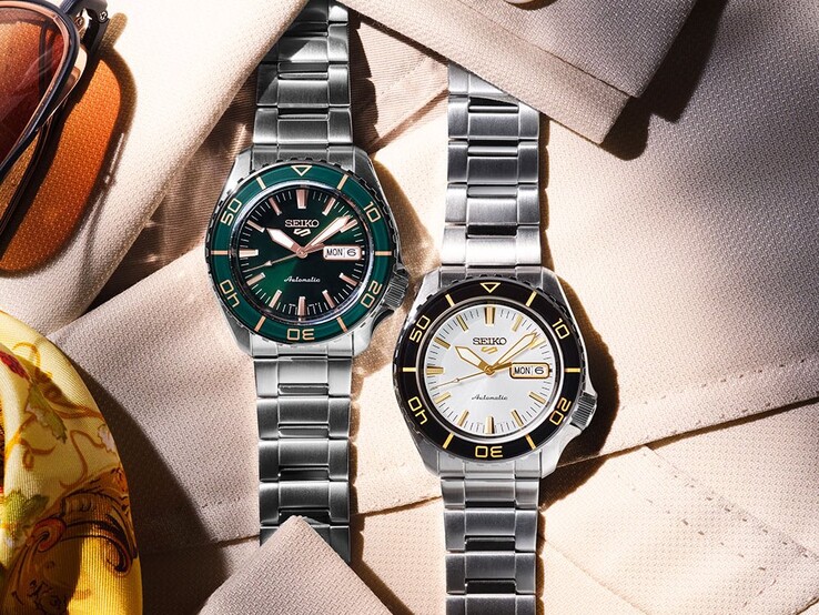 Seiko 5 Sports SKX HDB004 and HDB005 watches displayed side by side on fabric, showing the white-and-black HDB004 and green-and-rose-gold HDB005.