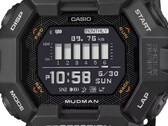 Casio G-Shock Mudman GDG-B100 watch with red and white digital display against a rugged mountain landscape.