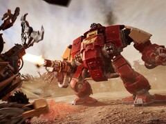 A Blood Raven Space Marine Dreadnought fires its weapon at Ork units in Warhammer 40,000: Dawn of War IV’s in-engine trailer. (Image source: Warhammer via YouTube)