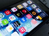Close-up of a smartphone screen with many app icons