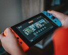 A picture of the Nintendo Switch console in use