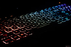 Four-zone RGB lighting with multiple modes.
