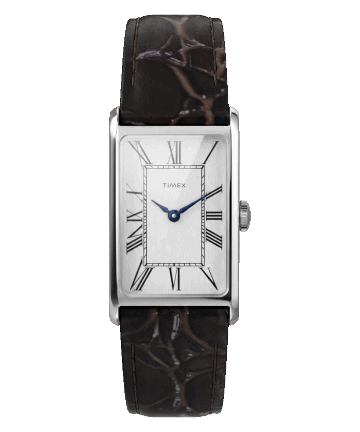 The silver-tone dial has a vertically brushed texture, elongated Roman numerals, metallic blue hands and a domed mineral crystal.