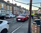 An electric car charging on the street in the UK (Image source: SGS Energy)