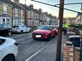 An electric car charging on the street in the UK (Image source: SGS Energy)