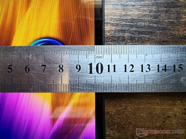 Narrow side bezels with a much thicker bottom bezel