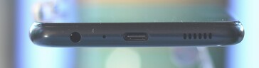 Bottom: 3.5mm audio jack, microphone, USB-C port, speaker