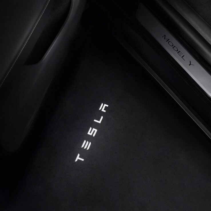 The Model Y puddle lights project a high-res Tesla logo on the ground
